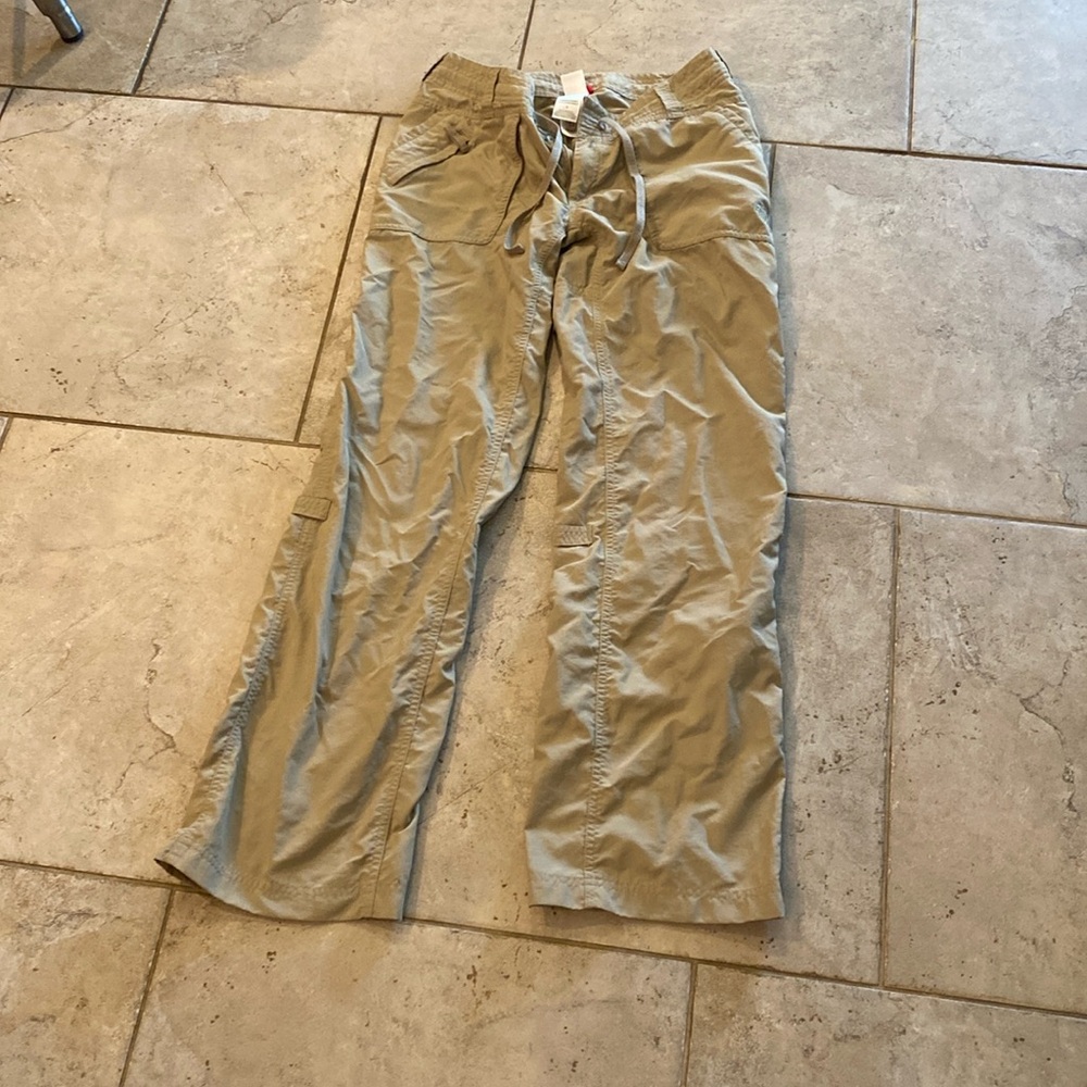The North Face Size 4 Light Nylon Tan Active Pants. Excellent condition.
